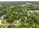 Aerial view of the house surrounded by lush trees, offering a sense of privacy and tranquility at 2343 Herndon Dr, Charleston, SC 29414