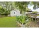 Backyard offers a deck, lush greenery, and a well-maintained lawn, perfect for outdoor enjoyment at 2343 Herndon Dr, Charleston, SC 29414