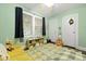 Bedroom offers natural light, light green walls, and a cozy atmosphere for play and relaxation at 2343 Herndon Dr, Charleston, SC 29414