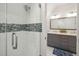 Stylish bathroom with glass enclosed shower and granite counters with modern sinks and fixtures at 2621 Anchor Watch Dr, Wadmalaw Island, SC 29487