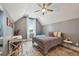 Comfortable bedroom with sloped ceilings, soft decor, plush accents, and natural light at 2621 Anchor Watch Dr, Wadmalaw Island, SC 29487