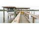 A private boat lift with a boat parked, offering easy access to the water at 2621 Anchor Watch Dr, Wadmalaw Island, SC 29487