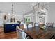 Gourmet kitchen featuring island seating, pendant lights, and a seamless flow to the living space at 2621 Anchor Watch Dr, Wadmalaw Island, SC 29487