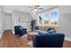 Bright living room with neutral paint, ample natural light and relaxed seating and stylish area rug at 2621 Anchor Watch Dr, Wadmalaw Island, SC 29487