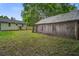 View of the backyard and storage shed behind the home at 2702 Decatur St, North Charleston, SC 29405