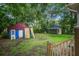 Residential backyard features a shed, outdoor buildings, and green lawn at 2702 Decatur St, North Charleston, SC 29405