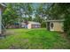 Large backyard with storage shed, mature trees and ample green space at 2702 Decatur St, North Charleston, SC 29405