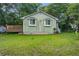 Charming bungalow style home featuring a quaint front porch and well-maintained lawn and landscape at 2702 Decatur St, North Charleston, SC 29405