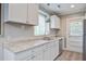 Bright kitchen featuring white cabinets, stainless appliances, granite countertops, stainless sink at 2702 Decatur St, North Charleston, SC 29405