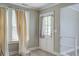 Bright living room featuring hardwood floors, neutral walls, and natural light at 2702 Decatur St, North Charleston, SC 29405