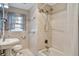 The bathroom is equipped with a shower-tub combo, and a classic pedestal sink at 2903 Shadow Ln, North Charleston, SC 29406