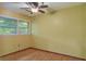 Sunny bedroom features hardwood floors, a ceiling fan, and large windows for natural light at 2903 Shadow Ln, North Charleston, SC 29406