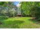 This property includes a storage shed in the large, grassy backyard at 2903 Shadow Ln, North Charleston, SC 29406