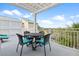 Inviting outdoor balcony with comfortable seating and a beautiful view of the surrounding area at 2942 Atrium Villa Dr # 42, Johns Island, SC 29455