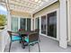 Comfortable seating area on the balcony next to sliding glass doors that lead inside at 2942 Atrium Villa Dr # 42, Johns Island, SC 29455