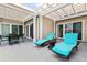 Relaxing balcony featuring lounge chairs, a table, and seamless access to the indoor living space at 2942 Atrium Villa Dr # 42, Johns Island, SC 29455