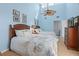 Light-filled bedroom with two queen beds, a ceiling fan, and tasteful coastal decor at 2942 Atrium Villa Dr # 42, Johns Island, SC 29455
