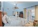 Comfortable bedroom offering a relaxing ambiance and convenient access to an outdoor balcony at 2942 Atrium Villa Dr # 42, Johns Island, SC 29455