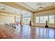 Well-lit fitness room equipped with exercise equipment and ample space for group activities at 2942 Atrium Villa Dr # 42, Johns Island, SC 29455