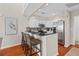 Well-equipped kitchen with stainless steel appliances, granite countertops, and bar stool seating at 2942 Atrium Villa Dr # 42, Johns Island, SC 29455