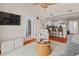 Inviting living room featuring a ceiling fan, comfortable seating, and open access to the kitchen at 2942 Atrium Villa Dr # 42, Johns Island, SC 29455