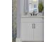 Modern bathroom features a white vanity, stylish fixtures, and a serene aesthetic, perfect for relaxation at 3031 Robeson Trce, Johns Island, SC 29455