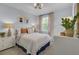 This relaxing bedroom features a light palette, natural light, and a comfortable queen bed at 3031 Robeson Trce, Johns Island, SC 29455
