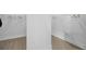 Bright walk-in closet with shelving and wooden floors at 3031 Robeson Trce, Johns Island, SC 29455