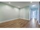 Bright bedroom with hardwood floors and access to other rooms at 3125 Sturbridge Rd, Mount Pleasant, SC 29466