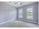 Relax in this cozy bedroom with soft carpet and two windows offering scenic views at 3125 Sturbridge Rd, Mount Pleasant, SC 29466