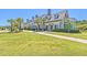 Attractive townhouse community with manicured lawns, mature trees, and well-maintained sidewalks at 3125 Sturbridge Rd, Mount Pleasant, SC 29466