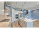 Open-concept kitchen with stainless steel appliances, a center island, and hardwood floors at 3125 Sturbridge Rd, Mount Pleasant, SC 29466