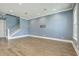 Bright, open-concept living room features recessed lighting and light wood flooring at 3125 Sturbridge Rd, Mount Pleasant, SC 29466