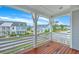 This community has stunning homes that can be seen from this porch with wooden floors at 3125 Sturbridge Rd, Mount Pleasant, SC 29466