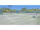 Well-maintained community tennis courts with shaded benches and green fencing, perfect for recreational play at 3125 Sturbridge Rd, Mount Pleasant, SC 29466
