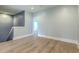 Upstairs landing with wood floors, bright paint, and access to other rooms at 3125 Sturbridge Rd, Mount Pleasant, SC 29466