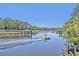 Scenic waterway view featuring a boat cruising through calm waters at 3125 Sturbridge Rd, Mount Pleasant, SC 29466