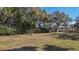 Expansive backyard with lush greenery and mature trees at 316 Anadale Ct, North Charleston, SC 29418