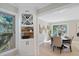 Bright dining room adjacent to butler's pantry, filled with natural light from windows overlooking the yard at 316 Anadale Ct, North Charleston, SC 29418