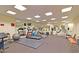 Enjoy the convenience of the community fitness center with modern exercise equipment and mirrors at 330 Concord St # 8E, Charleston, SC 29401
