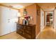 Inviting hallway with a decorative dresser, hardwood floors, and plenty of storage space at 330 Concord St # 8E, Charleston, SC 29401