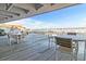 This spacious outdoor patio has bridge views and is perfect for relaxation or entertainment at 330 Concord St # 8E, Charleston, SC 29401