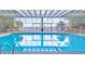 The large indoor pool area is a perfect place to unwind and offers comfortable seating at 330 Concord St # 8E, Charleston, SC 29401