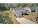 The lovely home has a long driveway, fenced yard, shed, and mature landscaping at 3473 Plow Ground Rd, Johns Island, SC 29455