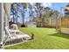 Large backyard with a patio area, outdoor seating, a storage shed, and a play area, perfect for Gathering fun and relaxation at 3473 Plow Ground Rd, Johns Island, SC 29455