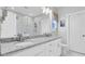 Elegant bathroom with double vanity, granite countertop, and a glass-enclosed shower for convenience at 3473 Plow Ground Rd, Johns Island, SC 29455