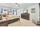 Comfortable bedroom with a king-size bed, dresser, and serene decor for a peaceful retreat at 3473 Plow Ground Rd, Johns Island, SC 29455