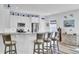 Stylish kitchen with granite countertops, stainless steel appliances, and modern barstool seating at 3473 Plow Ground Rd, Johns Island, SC 29455