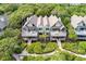 Stunning aerial view features townhouses, lush gardens, and private balconies at 3560 Shipwatch Rd, Kiawah Island, SC 29455