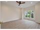 Bright bedroom featuring a ceiling fan, recessed lighting and a view to the outdoors at 3560 Shipwatch Rd, Kiawah Island, SC 29455